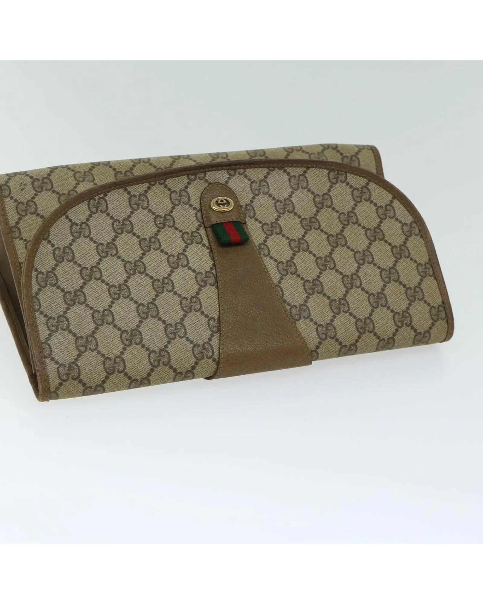 Supreme Web Sherry Line Clutch Bag with Iconic Red and Green Accents